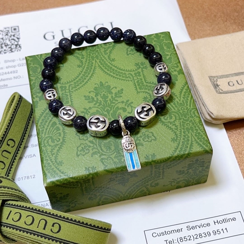 G*u*i bracelets